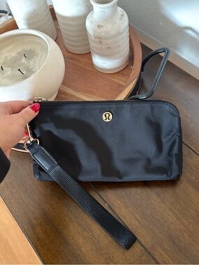 lululemon athletica Black Wristlet with Gold Logo